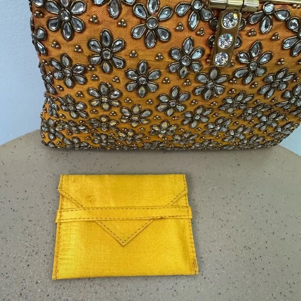 Meera Mahadevia Fully Embellished Satin Marigold Yellow Clutch Purse